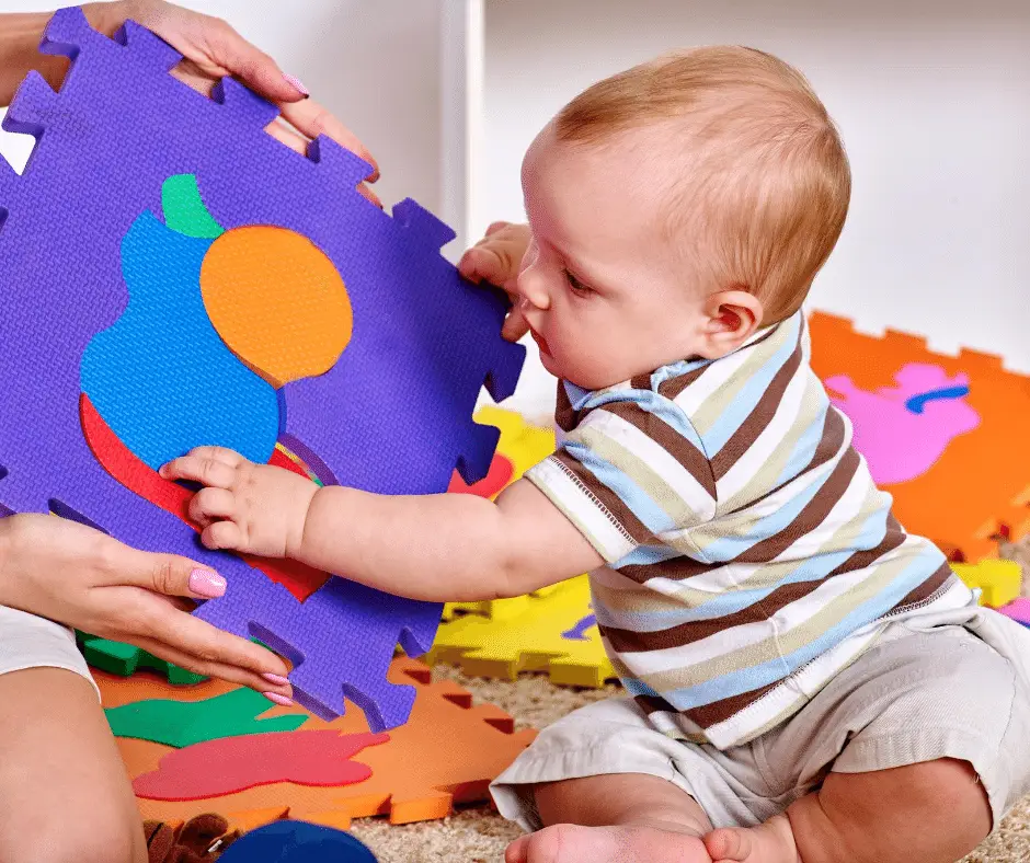 Child playing with shapes